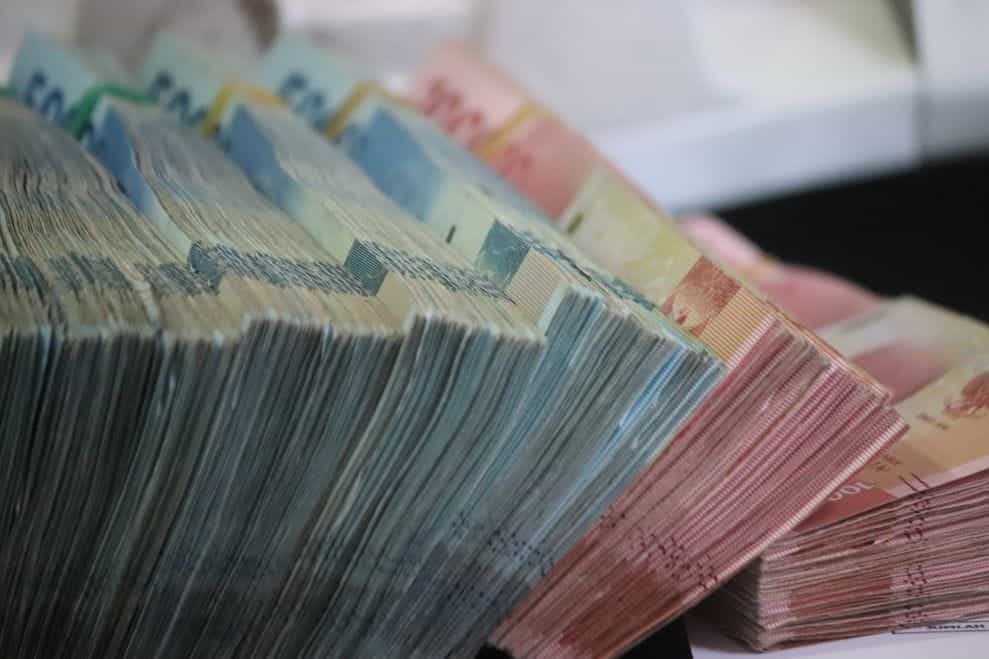 Stacks of Currency Notes of Different Colours.