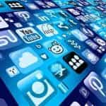 A sea of different digital media and social media platform icons on a vast blue background.