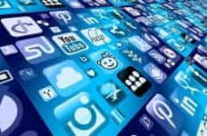 A sea of different digital media and social media platform icons on a vast blue background.