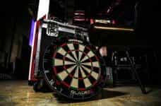 A dart board placed backstage amongst equipment at a PDC event..