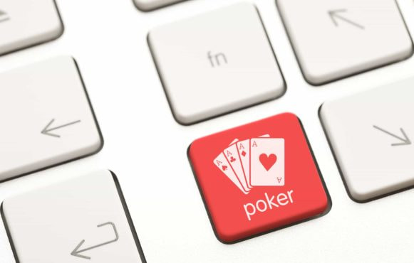 Red computer key with an aces image and the word poker written on it.