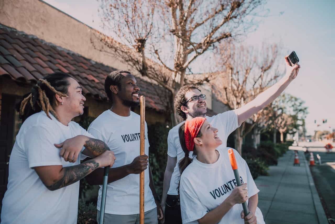 A group of volunteers with tools.