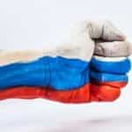 A fist painted in the colors of the Russian flag