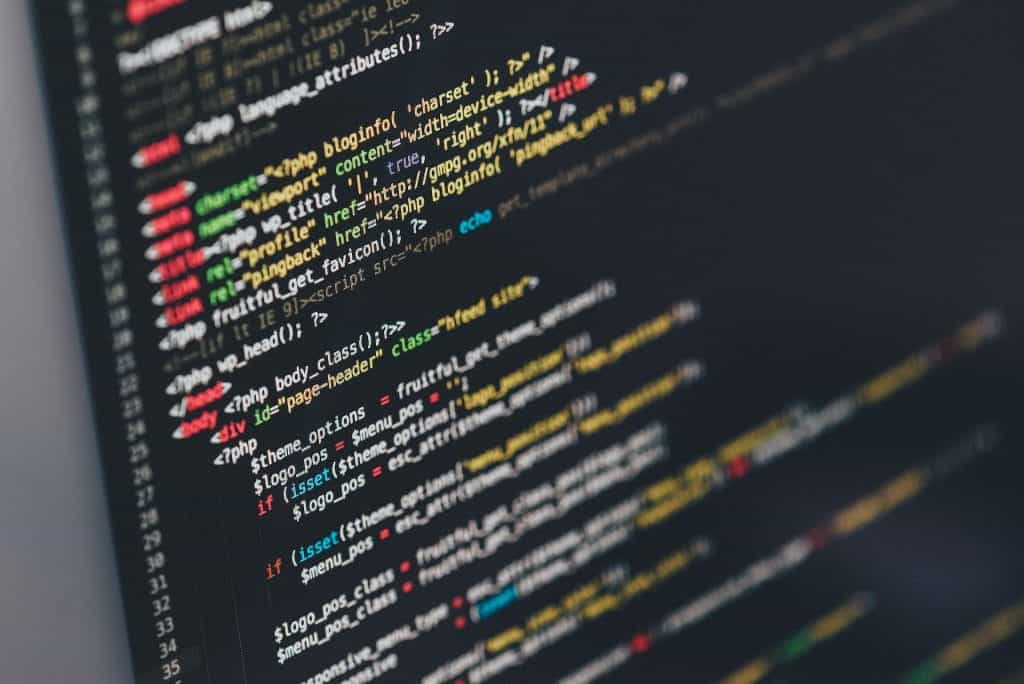 Lines of code on a laptop screen.