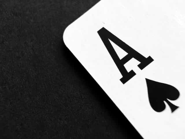 An ace of spades playing card.