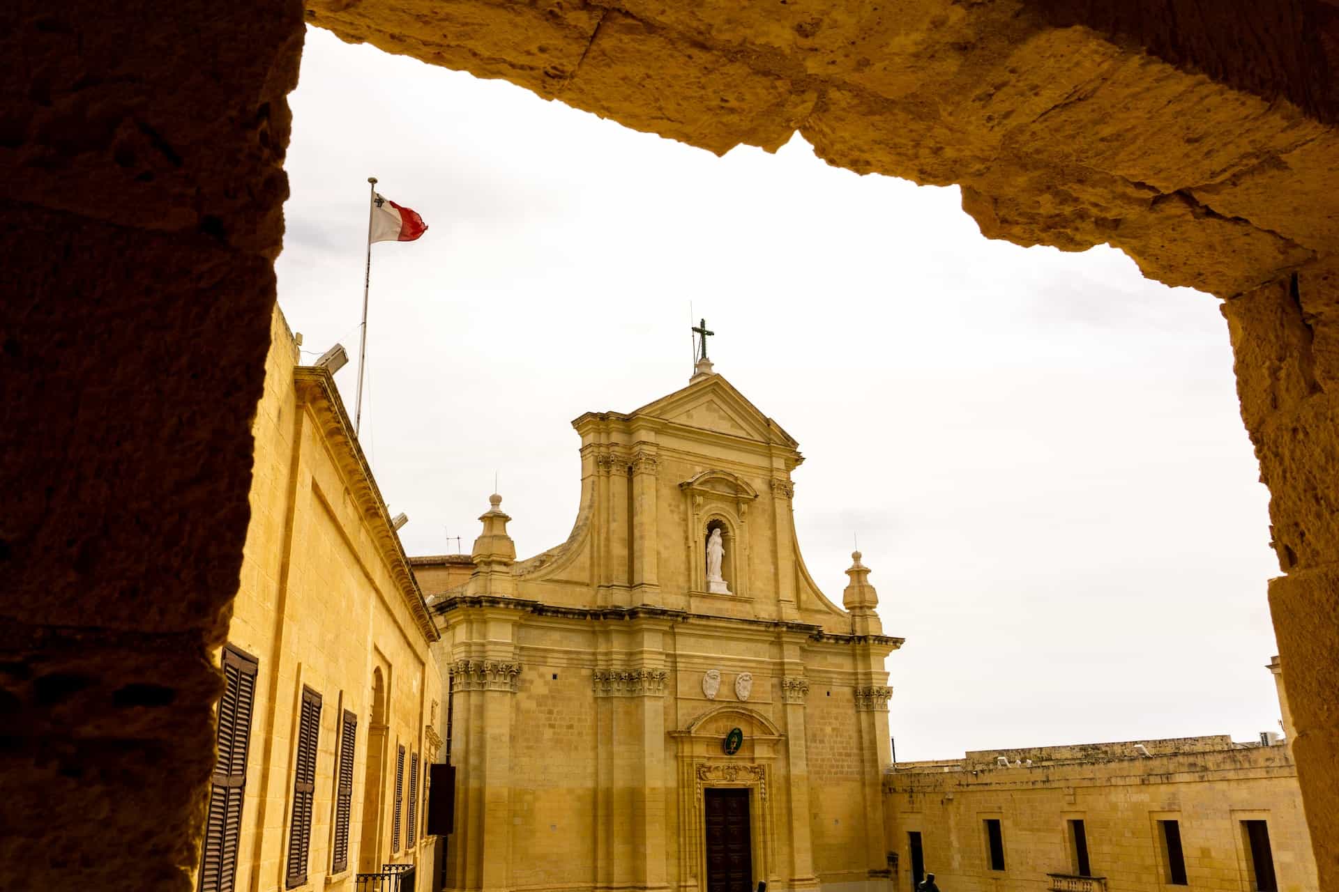 A Malta flag on a cathedral