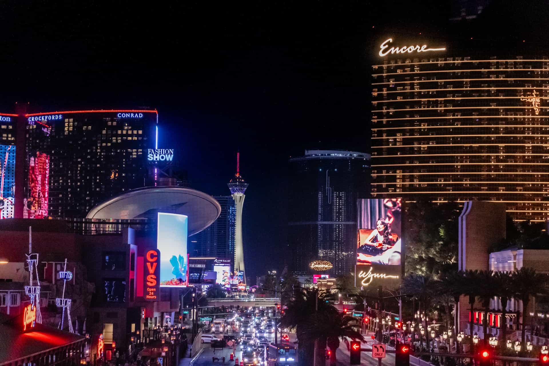 The world-famous strip in downtown Las Vegas, Nevada, featuring numerous casino and hotel complexes and endless neon lights.