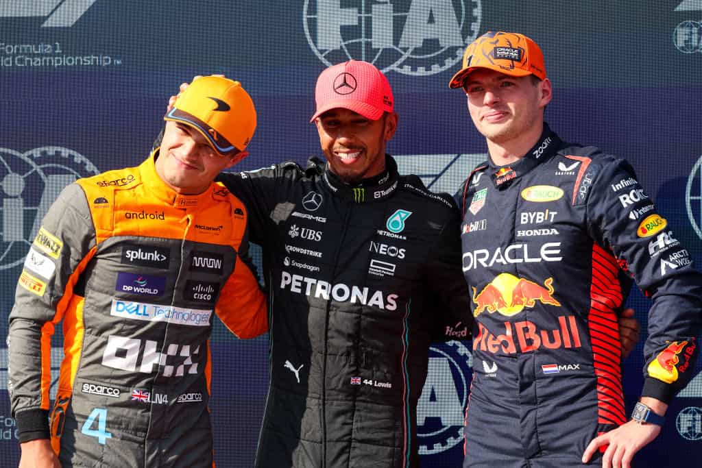 Lewis Hamilton, Max Verstappen and Lando Norris pose for a picture at the 2023 Hungarian Grand Prix.