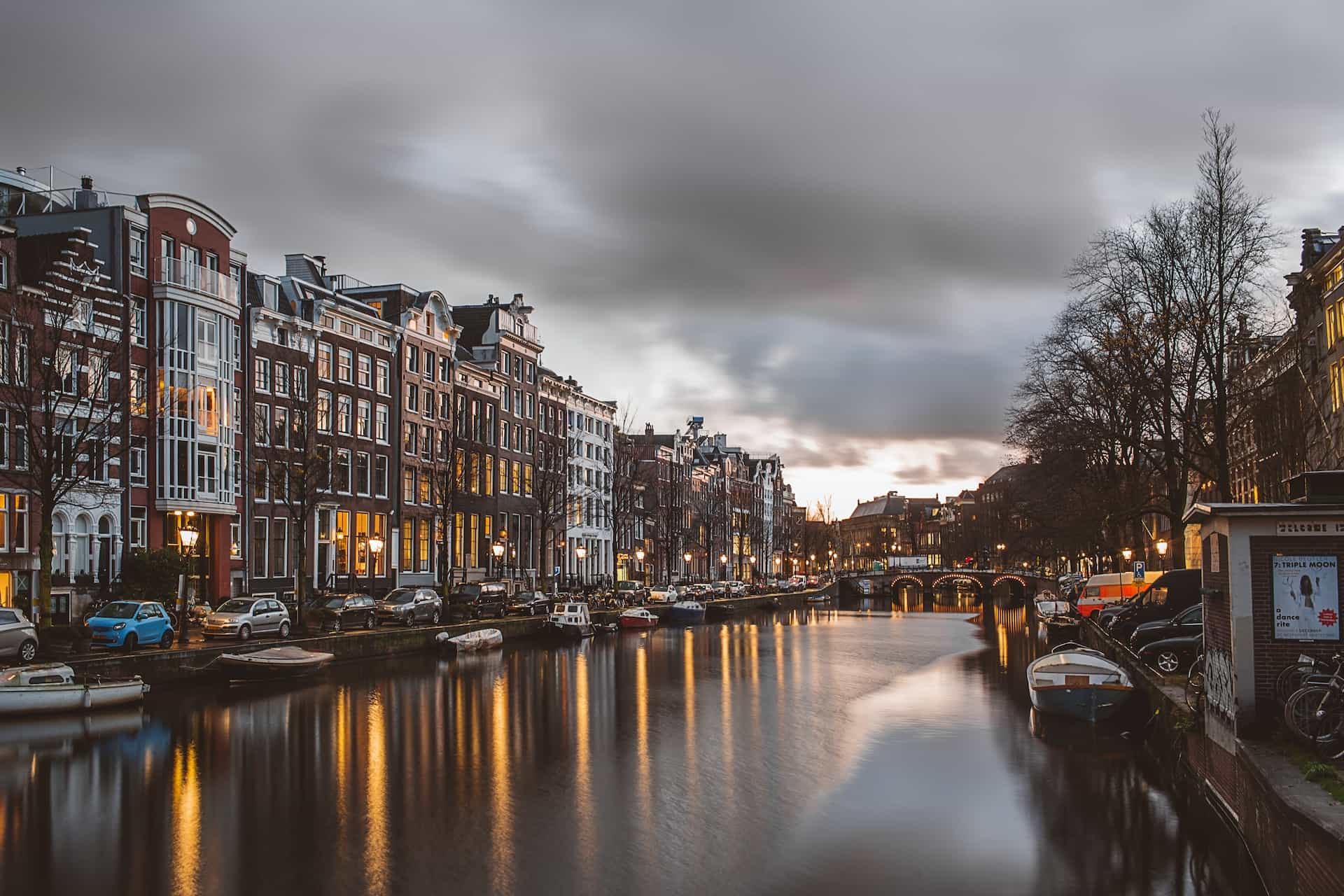 A cityscape with a river.
