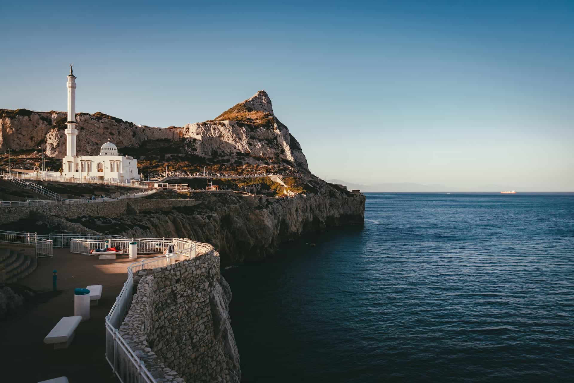 A church on a cliff near the sea.