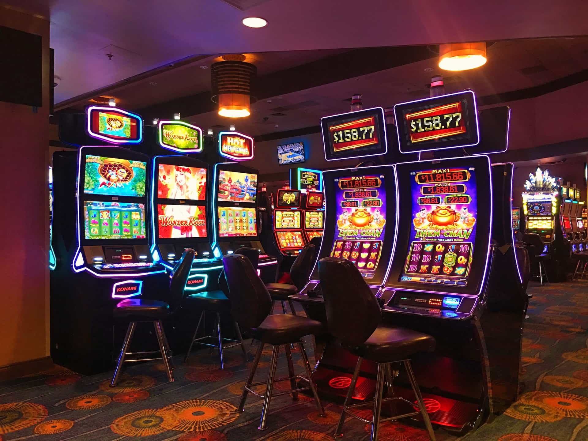 Modern slot machines in a casino gaming room.