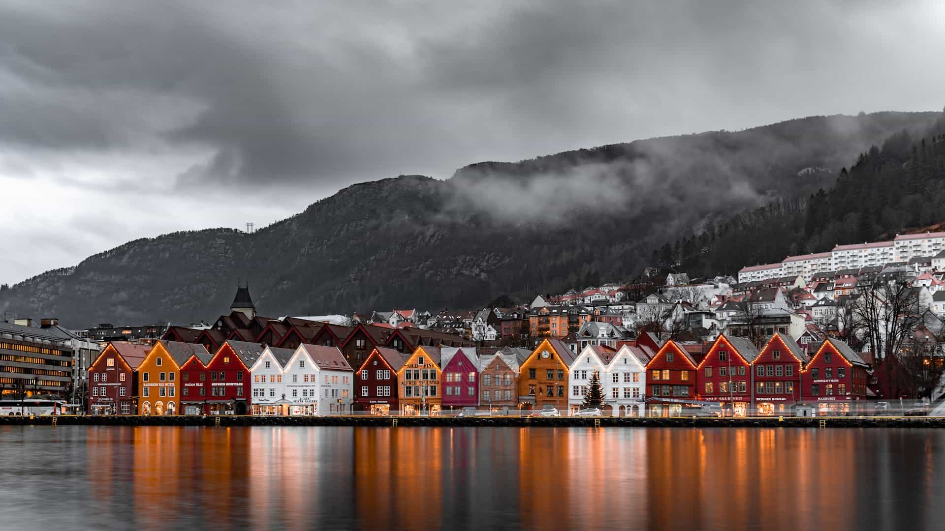 A panoramic view of buildings near a water body.