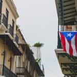 Puerto Rico’s flag hangs on a balcony.