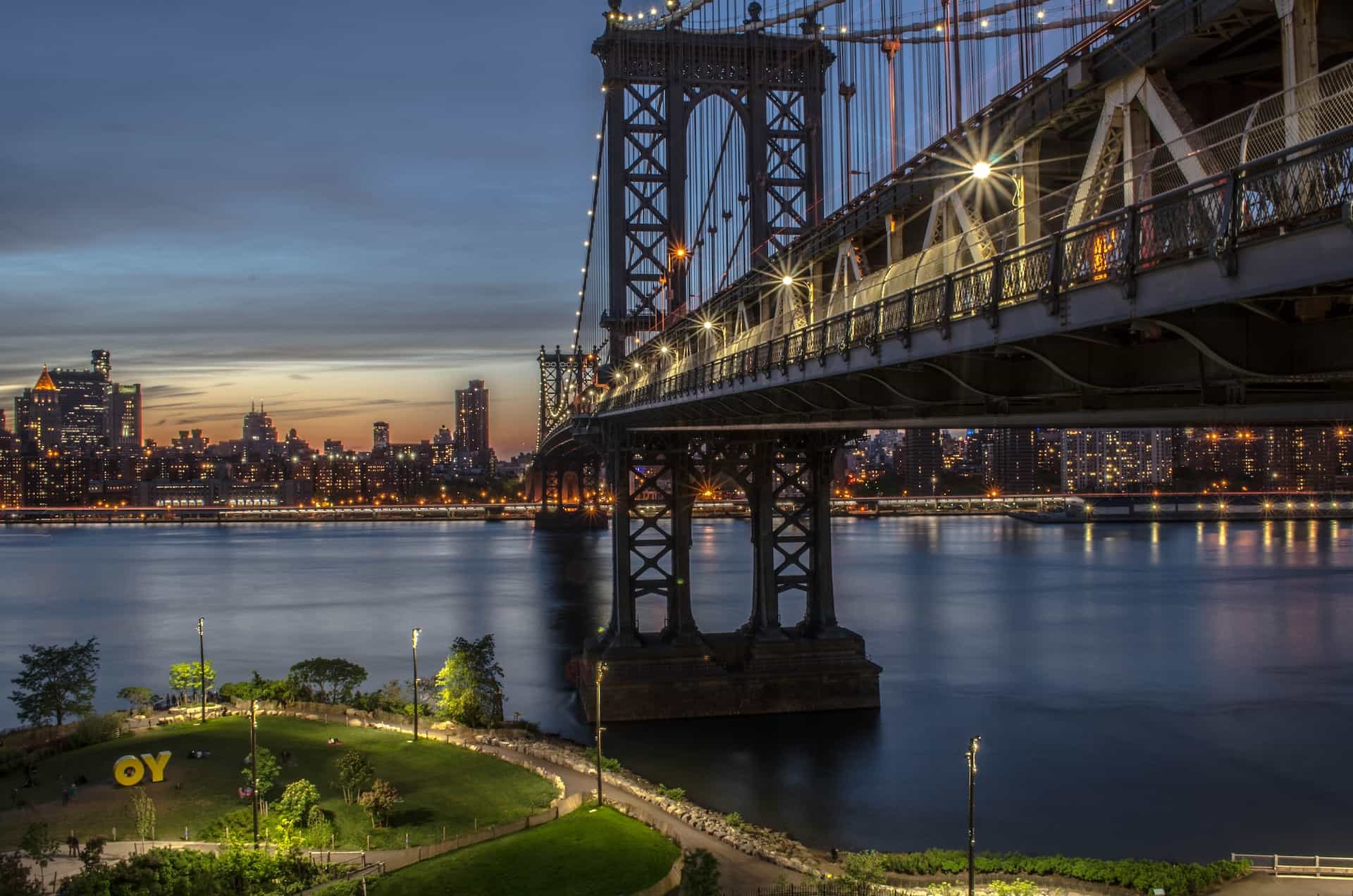 A large bridge in New York City leading from Manhattan to one of its outer boroughs.