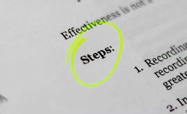 A piece of paperwork with the word ‘Steps’ circled with a yellow highlighter pen.