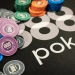 A stack of 888poker branded poker chips.