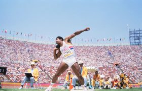 Daley Thompson putting the shot during the decathlon at the 1984 Olympic Games.