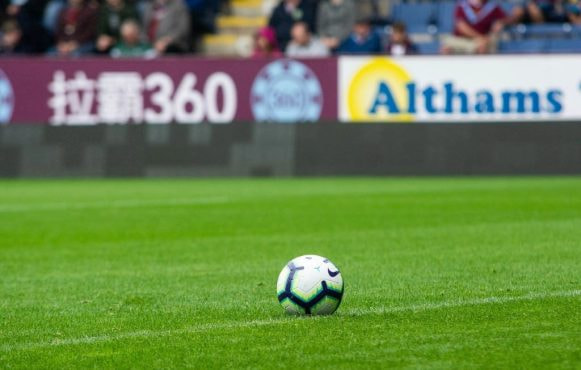 An image showing a Premier League football match.