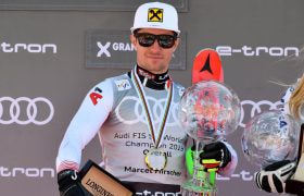 Marcel Hirscher collects his globe for winning the overall standings 2019 FIS Alpine Ski World Cup standings.