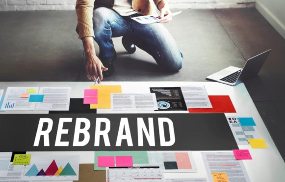 A Rebrand Process Being Done with a Laptop