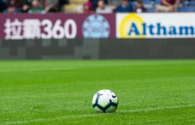 A Ball on a Football Pitch