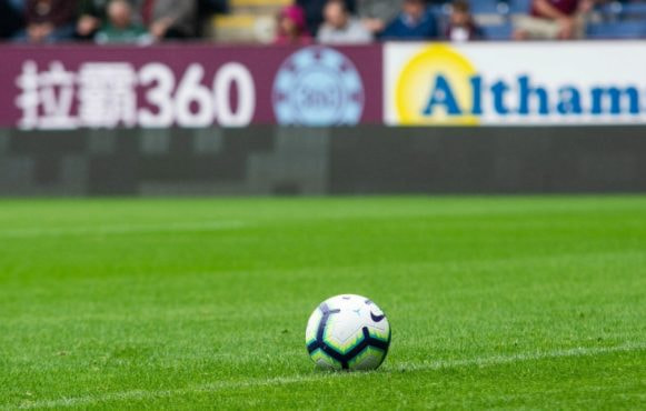 A Ball on a Football Pitch