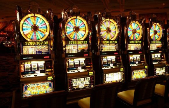 An image showing slot machinesat a casino.