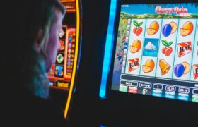 Slot player playing in a casino