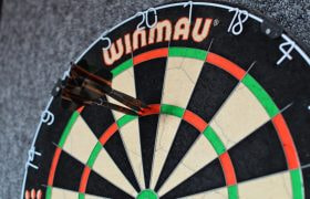 An Image of a Dartboard Showing a Player Has Scored 180 from Their Throw