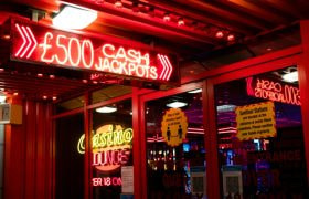 An Image of a Casino Sign Glowing in the Dark