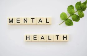 An Image Showing the Words Mental Health Spelled Out in Tiles