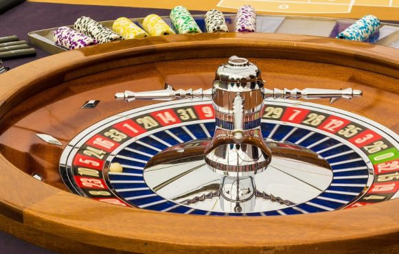 A Gaming Table With a Roulette Wheel