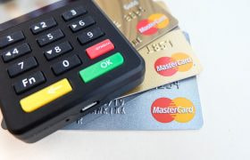 A Pile of Bank Cards with a Calculator