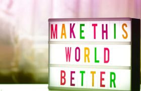 An Image Where Make This World Better is Written