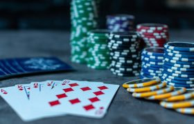 A Gaming Table With Poker Cards and Chips
