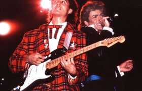 George Michael and Andrew Ridgeley performing on stage