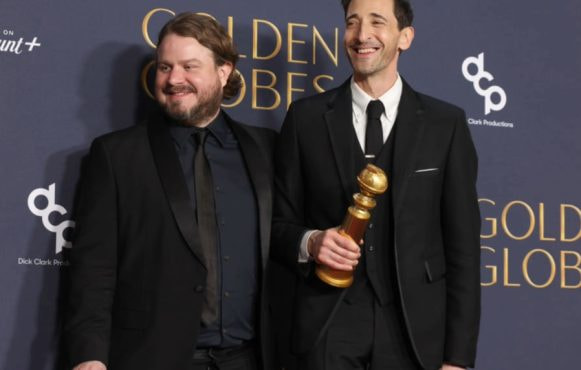 Brady Corbet and Adrien Brody at the 82nd Annual Golden Globe Awards.