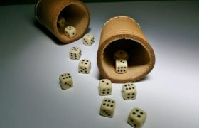 An image showing gambling dice in action