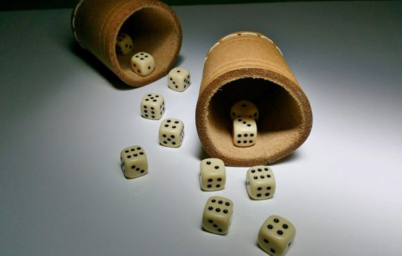 An image showing gambling dice in action