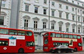 Two London City Buses Parked on the Street