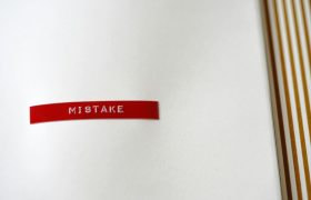 The Word Mistake on a Piece of White Paper