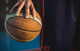 A Person Holding a Basketball