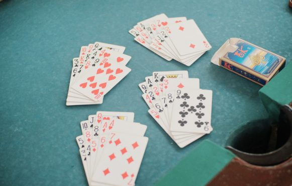 An image showing playing cards on a gambling table