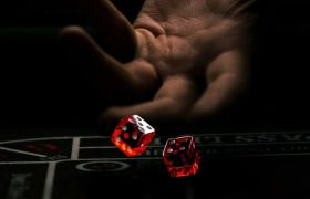 Gambling Dice Being Thrown