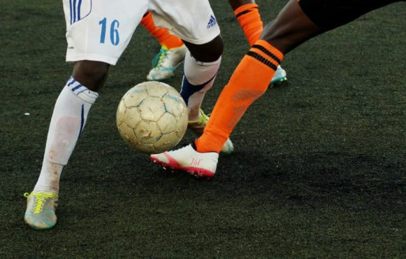 An image showing a football match in action