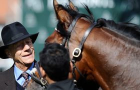 Sir Henry Cecil with Frankel at Newmarket in 2012.