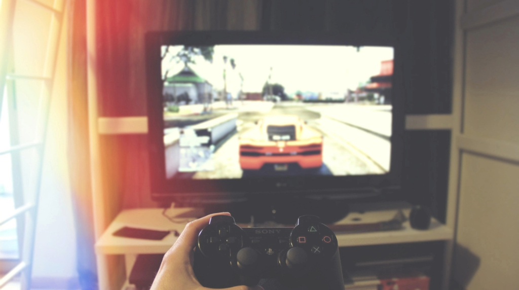 Someone Playing a Video Game on a PlayStation