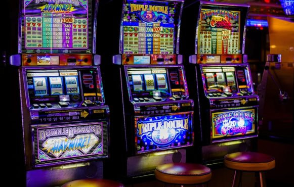 A Trio of Slot Machines in a Casino