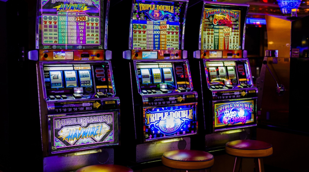 A Trio of Slot Machines in a Casino