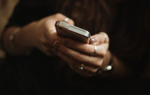 A Person Using a Mobile Phone